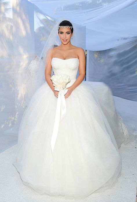 Startraks  -Cosmopolitan.com For Authentic Vintage Wedding Jewelry go to: https://www.etsy.com/shop/ButterflyEffectInc Kardashian Wedding Dress, Kim Kardashian Wedding Dress, Kim Kardashian Wedding, Kardashian Wedding, Celebrity Bride, Silver Cocktail Dress, Celebrity Wedding Dresses, Wedding Dresses Vera Wang, Hillary Duff