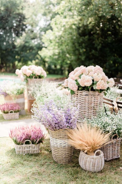 various sized wicker baskets holding pastel florals Spring Event Ideas, Martha Stewart Wedding, Secret Garden Party, Secret Garden Parties, Garden Wedding Reception, A Secret Garden, Garden Venue, Garden Spring, Flower Bar