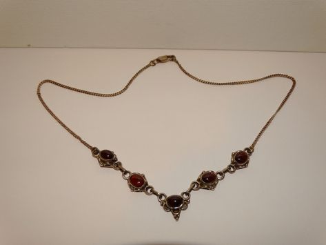 "The necklace is made with sterling silver stamped featuring 5 garnet cabochons, the necklace length is 16.5\" inches, weight 11.3 grams, the cabochon garnet stone size is 7 x 5mm in excellent condition." Jewelry Stack, Pretty Accessories, Cabochon Necklace, Swarovski Crystal Bracelet, Owl Wall, Garnet Necklace, Stacked Jewelry, Garnet Stone, Fantasy Jewelry