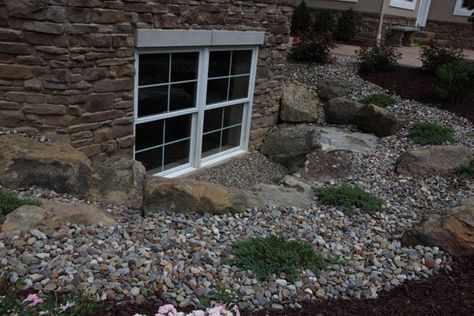 landscaping around basement windows Egress Window Landscaping, Basement Window Well, Stone Paths, Yard Makeover, Decorative Gravel, Egress Window, Window Well, Basement Windows, Easy Landscaping