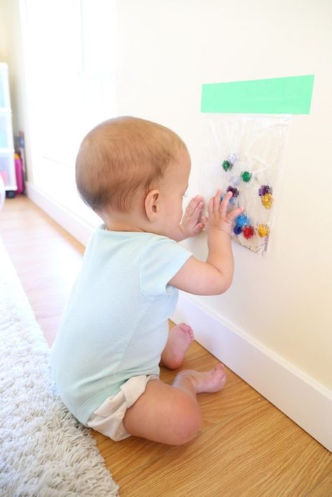 Encourage baby sitting practice with this engaging sensory activity. It's easy to set up and something that you and baby can play with again and again. Baby Development Activities, Sensory Bags, Baby Sensory Play, Baby Sitting, Baby Play Activities, Learning Games For Kids, Sensory Activity, Baby Learning Activities, Baby Education