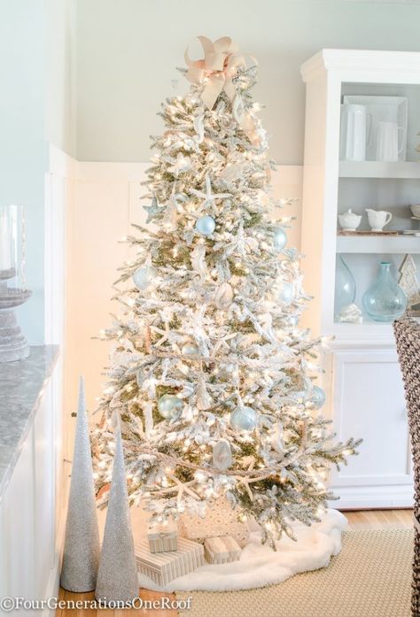 Coastal Christmas Tree Ideas, Beach Christmas Trees, Blue Ornaments, Coastal Christmas Tree, Flocked Christmas Trees Decorated, Florida Christmas, Coastal Christmas Decor, Beachy Christmas, Nautical Christmas