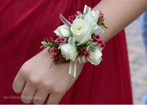 FREE HOMECOMING FLOWER TUTORIALS http://www.wedding-flowers-and-reception-ideas.com/make-your-own-wedding.html Learn how to make corsages and matching boutonnieres. Buy corsage bracelets, flower jewels, floral supplies and more. Dainty white sweetheart roses accented with hot pink wax flower and variegated miniature leaves. Red Corsages, Prom Flowers Corsage, Bracelet Corsage, Yellow Prom Dress, White Corsage, Homecoming Flowers, Prom Corsage And Boutonniere, Homecoming Corsage, Wrist Corsage Prom