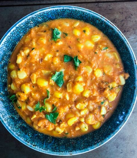 Fresh and juicy sweet corn gets dunked in rich and creamy curry flavored   with warm Indian spices. Enjoy this creamy corn curry with rice or   roti. Full recipe on kitchendocs.com #recipes #easyrecipe #corn #curry   #vegetarian #indianfood Indian Corn Recipes, Corn Curry, Curry With Rice, Creamy Curry, Creamy Corn, Global Cuisine, Gujarati Recipes, Corn Recipes, Fusion Food