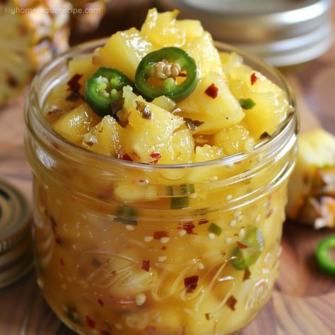 This Pineapple Cowboy Candy recipe combines the sweetness of pineapple with the heat of jalapeños, creating a delicious condiment perfect for any meal. Cowboy Jalapeno Candy Canned, Cowboy Candy With Pineapple Recipe, Pineapple Salsa For Canning, Candied Jalapeños With Pineapple, Candies Jalapenos, Texas Candy Jalapenos, Cowboy Candied Jalapenos, Cowboy Candy Relish, Cowboy Candy With Honey