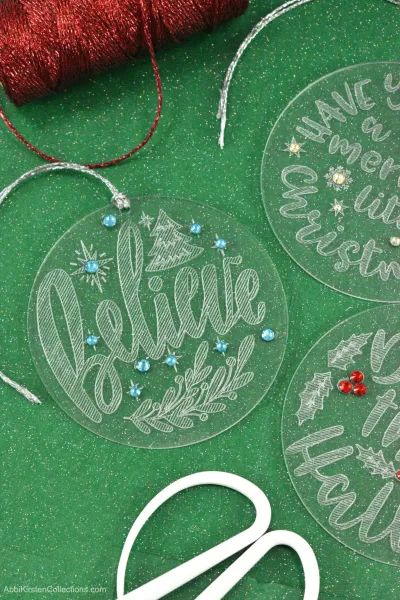 Christmas Ornaments With Cricut, Christmas Ornaments With Names, Ornaments With Cricut, Acrylic Christmas Ornaments, Cricut Ornaments, Engraved Christmas Ornaments, Engraved Ornaments, Engraved Acrylic, Engraved Dog Tags