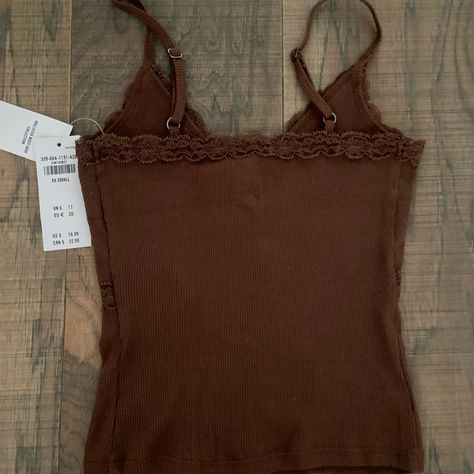 New With Tags! Poshmark Clothes, Brown Tank Top, Hollister Tank Tops, Clothes Y2k, Blue Halter Top, Boho Tank Top, Y2k Tops, Loose Tank Tops, Lace Cami Top