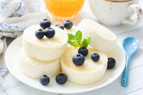 Syrniki, sirniki or cottage cheese pancakes on white plate. Russian food. Healthy breakfast food Healthy Breakfast Food, Food Healthy Breakfast, Cottage Cheese Pancakes, Cheese Pancakes, Russian Food, White Plate, Russian Recipes, White Plates, Food Healthy