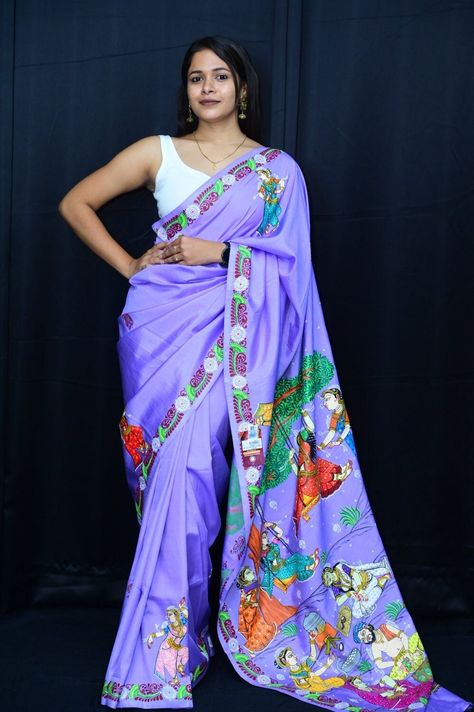 This authentic patachitra silk saree has an artistic depiction of motifs that illustrates a story. The painting on the saree is the handwork of the artists that the district of Puri is famous for. These are storytelling fabrics. This is a genuine handwoven piece, unevenness in the selvedge and weave could be expected, and colors may fade or bleed due to the traditional dyeing method employed. Specification: Occasion: Festive Wear Fabric: Khadi Silk Primary Color: Green Secondary Color: Red Material :  Khadi Silk Pattern: Motif Border Type: Handicrafts Border Size: Medium Blouse Piece: Included Care: Dry Clean Disclaimer : This is a genuine handwoven piece, & that could expect unevenness in the selvedge and weave, and colours may fade or bleed due to the traditional dyeing method employed. Ram Sita Vivah, Pattachitra Saree, Ram Sita, Pattern Motif, Silk Pattern, Heavy Work, Festive Wear, Blouse Piece, Festival Wear