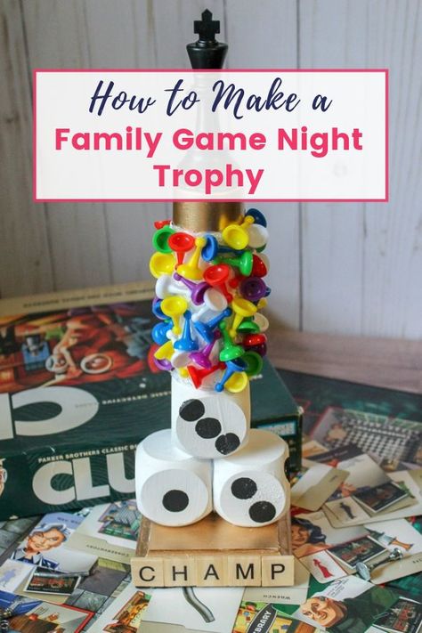 Having a handmade rotating family game night trophy makes game night a lot more fun!  Celebrate the nights champion with this game night trophy or let the winner hold it at the end of each game.  This easy framily craft will make family game nights memorable and leave fun stories to tell for generations to come. We are also talking great Family Game Night Ideas and Tricks! Game Night Trophy, Diy Family Games, Family Game Night Party, Game Night Decorations, Family Game Night Ideas, Diy Trophy, Trophy Diy, Game Night Ideas, Game Night Food