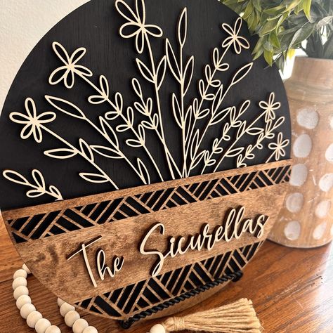 Make any space truly special with our beautifully crafted personalized wood sign. Perfect for housewarmings, bridal showers, or as a unique wedding gift, this sign adds a charming, rustic touch to any home.  Each detail is meticulously laser cut, providing a crisp and clean finish. DOES NOT COME WITH THE SHELF STAND AS SEEN IN THE PICTURES. SIZE OPTIONS: 12 inch: Perfect for shelves or small wall spaces.   15 inch: Ideal for entryways or medium-sized wall areas. 18 inch: Great for larger wall sp Family Name Signs Wood Cricut, Welcome Door Hanger With Names, Last Name Wood Art, Personalized Cricut Wood Wreath, Modern Cricut Signs, Custom Gifts Sign, Personalized Cricut Signs, Family Door Hanger Names, Wooden Family Name Sign Rustic