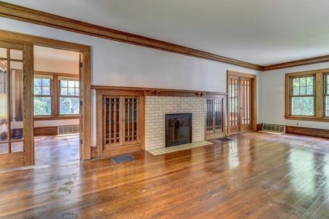 My 1920's living room. This is a picture prior to me purchasing what is now my home. I fell in love with the old world craftsmanship of the built-ins, the huge baseboards and the crown molding. ...looking at placement of picture rail at bottom of crown moulding. 1920 Living Room, 1920 House Interior Ideas, Blue Themed Living Room, Old House Living Room, 1920s Home Interior, 1920s Living Room, Long Narrow Rooms, 1920 House, Narrow Room