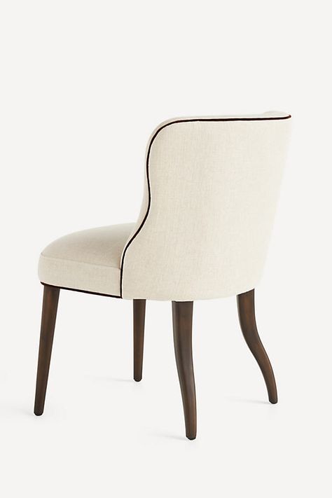 Valencia Linen Upholstery: 50% Viscose, 22% Linen, 16% Polyester, 12% Cotton Cushion fill: Foam & fiber Corner block frame Mortise & tenon leg construction Professional clean Imported | Meryl Dining Chair by Anthropologie in Beige, Women's End Dining Chairs Different, Cream Upholstered Dining Chairs, Aesthetic Advice, French Country Dining Chairs, Cheap Dining Chairs, Wingback Dining Chair, Styling Services, Transitional Dining Chairs, Traditional Dining Chairs