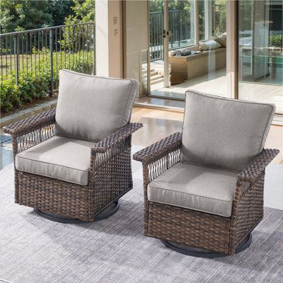 Transform your outdoor space into a cozy retreat with our set of 2 Rattan Patio Rocking Chairs. These high-back wicker swivel rocker chairs are designed for comfort and durability. The 4.3"" cushions provide a luxurious seating experience, while the 360-degree swivel function allows you to easily rotate for optimal sun exposure or to take in the scenery without moving the entire chair. The rocking and gliding motion adds a touch of relaxation, making it perfect for reading or watching the kids p Wicker Swivel Chair, Wicker Patio Chairs, Outdoor Glider, Swivel Rocker Chair, Rocker Chair, Glider Rocker, Patio Rocking Chairs, Rocker Chairs, Outdoor Rocking Chairs