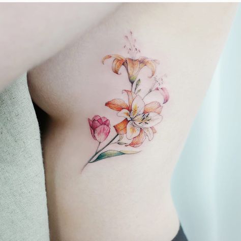 Tiger Lily Tattoo, Stargazer Lily Tattoo, Lilly Flower Tattoo, Tiger Lily Tattoos, Realistic Flower Tattoo, Lillies Tattoo, Lily Tattoo Design, Lily Flower Tattoos, Rib Tattoos For Women