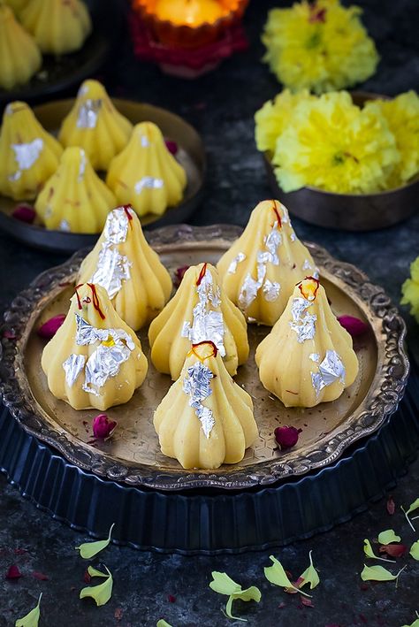 Kesar Mawa Modak is the perfect way to celebrate the festival of Ganesh Chaturthi. Whether you’re a fan of melt-in-your-mouth dessert or chewy treats- this sweet delivers everything in one bite! #ganeshchaturthi #modakrecipe #kesarmawamodak Modak Recipe, Dry Fruit, Indian Dessert Recipes, Indian Sweet, Indian Desserts, Indian Sweets, Fun Baking Recipes, Ganesh Chaturthi, Premium Ingredients