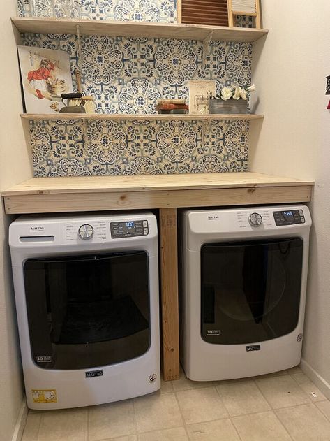 Remember when I did a makeover on my laundry nook? You can find all the details on my blog. Well I told you at that time that I planned to build a countertop over the washer and dryer to make a nice folding surface and some place to hold the detergent within reach.An added bonus is that it keeps things from falling between and behind the machines which was a constant problem.For a few reasons I never got around to building the counter and then a couple weeks ago my dryer died and my wa… Front Loading Washer And Dryer With Counter, Washer And Dryer Behind Curtain, Diy Raised Washer And Dryer, Outdoor Washer Dryer Enclosure, Waterfall Washer Dryer Countertop, Washing Machine Wooden Cover, Tabletop Over Washer And Dryer, Over Washer Storage, Washing Machine Table Top