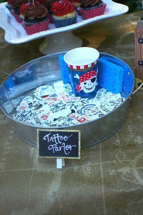 1st Birthday Pirate Theme, Tattoo Parlor Pirate Party, Pirate Party Tattoo Parlor, Mermaid And Pirate Party Food, Pirate Party Ideas Decorating, Pirate Themed Party Decorations, Pirate Themed 1st Birthday Party, Mermaid Pirate Party Decorations, Pirate Birthday Decorations