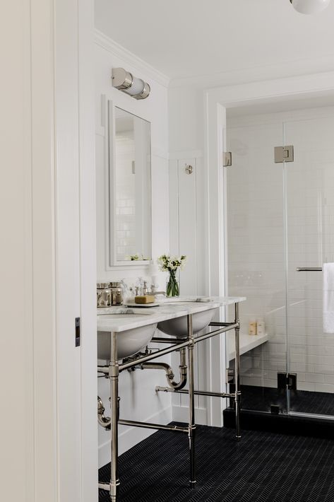 Tour a Seaside Long Island Home in Black and White – Frederic Magazine Frederic Magazine, Black Herringbone Tile, Herringbone Tiles, Saarinen Table, Americana Aesthetic, Nautical Colors, Elsie Green, Scandinavian Chairs, Primary Bath