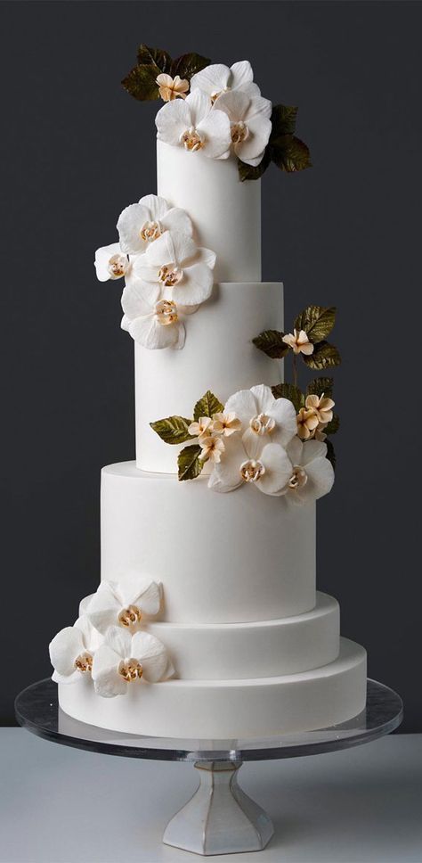 wedding cake, the most beautiful wedding cake, elegant wedding cake, wedding cake design, wedding cake inspiration, wedding cake photos, opulent wedding cake, wedding cake pictures, wedding cakes, wedding cake trends Wedding Cakes With Orchids, Wedding Cake Designs Elegant White, Spiral Wedding Cake, White Orchid Wedding Cake, Simple Wedding Cake Table Ideas, Wedding Cake Designs Elegant 2024, Wedding Cake Trends For 2024, Chocolate Cake Decoration Elegant, 2tier Wedding Cake