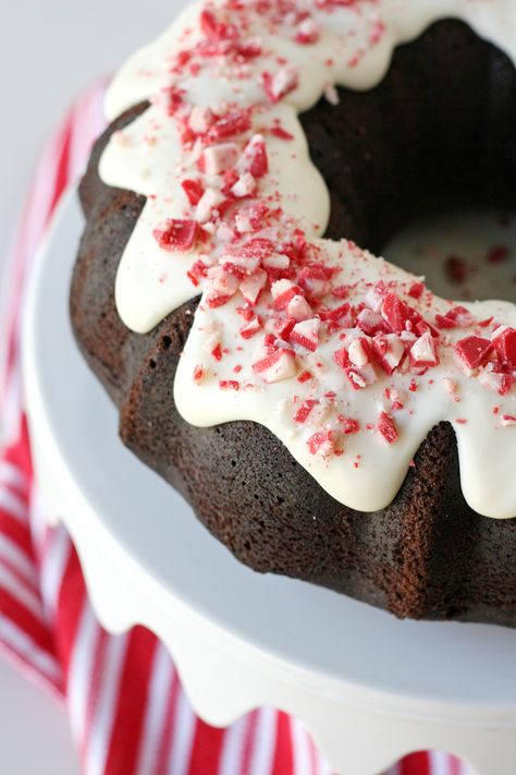 This rich and delicious Chocolate Peppermint Bundt Cake recipe is perfect for the holidays! Simply beautiful and surprisingly simple to make from scratch. Chocolate Peppermint Bundt Cake, Peppermint Bundt Cake, Christmas Bundt Cake, Chocolate Peppermint Cake, Red Birthday Cake, Peppermint Cake, New Year's Desserts, Bundt Cake Recipes, Chocolate Bundt