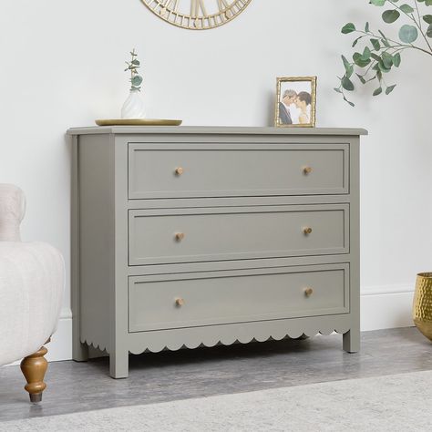 Behold the Scallop Chest of Drawers from the Staunton Taupe Range, a veritable trove of sartorial splendour wrapped in a dignified taupe cloak. This chest, with its trio of spacious drawers, each adorned with a jaunty knob, is a bastion of bedroom orderliness. Its delightful scalloped apron dances with a subtle whimsy, adding a playful edge to its stately silhouette. Perfect for the discerning organizer who desires a blend of capacious storage and charming aesthetics, it’s not just a chest—i Scallop Furniture, Chest Of Drawers Decor, Mirrored Bedroom Furniture, Classy Living Room, Chest Of Drawer, Whimsical Furniture, Warm Taupe, Nursery Room Design, Nursery Room Inspiration