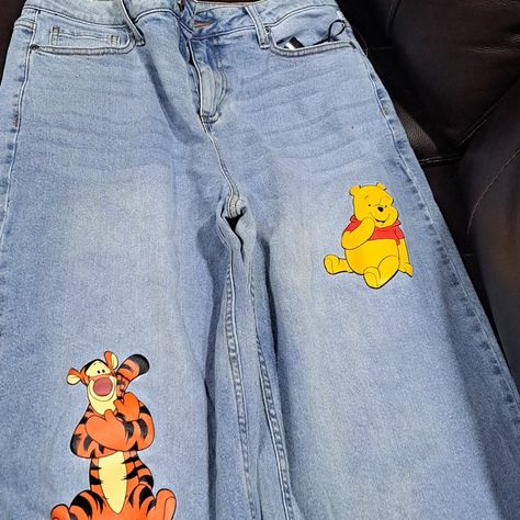 Take A Trip To The Hundred Acre Woods With These Hot Topic Winnie The Pooh Jeans, Item Comes From A Smoke Free Home. Winnie The Pooh Jeans, Cute Disney Themed Outfits, Clothes To Thrift, Winnie The Pooh Items, Pants Painting, Winnie The Pooh Outfit, Senior Pants, Disney Jeans, Custom Jeans Diy