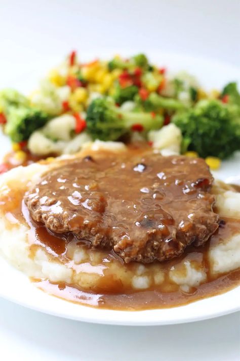 Instant Pot Cubed Steak and Gravy--a dump and go recipe with only 4 ingredients! Just like the cube steak and gravy your mom used to make. You can make this in the Instant Pot or the Crockpot. Steak And Gravy, Cube Steak And Gravy, Cubed Steak, Cube Steak, Tv Dinner, Easy Instant Pot Recipes, Instant Pot Dinner Recipes, Steak Dinner, Gravy Recipes