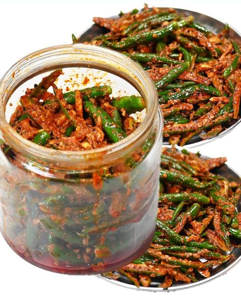 Store for months! Quick & Easy Green Chilli pickle recipe that will improve the taste of any dish manyfold. | Store for months! Quick & Easy Green Chilli pickle recipe that will improve the taste of any dish manyfold. You'll absolutely love it! :) | By Papa Mummy Kitchen Green Chilli Pickle Recipe, Mango Atchar, Chilli Pickle Recipe, Green Chilli Pickle, Chilli Pickle, Lunch Sides, Pickle Recipe, Homemade Spices, Green Chilli