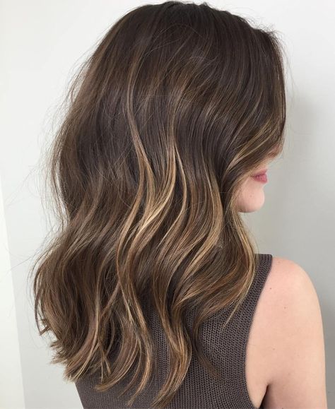 A partial balayage is a freehand coloring technique, when you apply highlights only to specific areas instead of throughout the whole head — generally, the top layer, or just around the face. Let`s see the best examples of this trend! The Benefit of Partial Balayage There are many reasons why one would choose a partial … Cool Undertone Balayage, Toning Down Highlights Brunettes, Fair Skin Brunette Balayage, Soft Balayage Brunette Subtle Highlights, Soft Highlights On Brown Hair, Partial Bayalage Brunette, Soft Brown Highlights, Deep Brown Hair With Highlights, Soft Highlights For Brown Hair