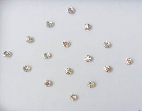 This Listing is for 6 Packs of Round /Dot Bindis. > In each pack there is 20 and 14 round bindis for 1 mm and 2 mm respectively. > For 1 mm: Total 120 Count Silver Diamond dots. > For 2 mm: Total 84 Count Silver Diamond dots. > Size 1 mm OR 2 mm Select from chart.Both size Fake Nose Stud, India Crafts, Fake Nose, Face Jewels, Indian Party Wear, Beauty Tattoos, Nose Stud, White Crystal, Diamond Crystal