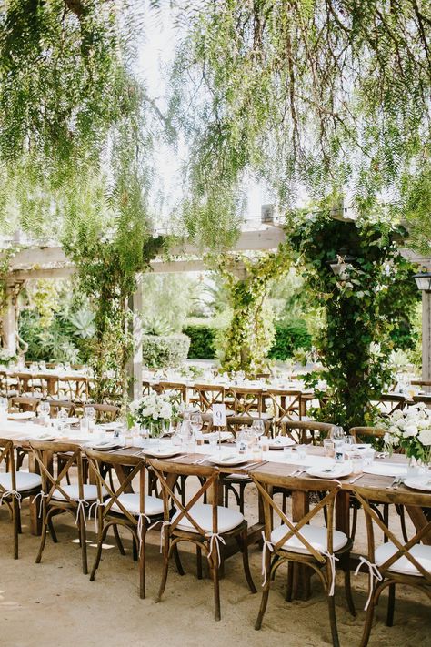 Sweetness overload! This cross-continental couple dated for 9 years before their al fresco wedding at the Santa Barbara Historical Museum. He may be from London, and she from Mississippi, but that never stopped their loving devotion to one another. We are thrilled to share their timeless wedding overflowing with happy and a whole lotta greenery! #ruffledblog Table Arrangement Wedding, Traditional Mexican Wedding, Family Style Table, Making A Wedding Dress, Wedding Backyard Reception, Outdoor Wedding Photography, Wedding Dresses Cinderella, Cinderella Wedding, Wedding Reception Inspiration