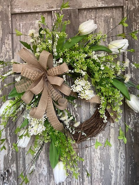 Step by step how to create using a trailing vine, twigs and florals. Grapevine Cross With Flowers, Extra Large Grapevine Wreaths, Haning Grapevine Wreaths, Double Front Door Wreaths, Grapevine Wreath With Hydrangeas, Tulip Grapevine Wreath, Spring Grapevine Wreath, Farmhouse Wreaths, Easter Door Wreaths