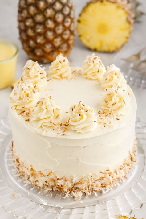 Coconut Cake Easter, Coconut Easter Cake, Coconut Pineapple Cake From Cake Mix Boxes, Coconut Pineapple Upside Down Cake, Coconut And Pineapple Cake, Coconut Cake Decoration Ideas, Pineapple Layer Cake Recipe, Bunco Desserts, Pineapple And Coconut Cake