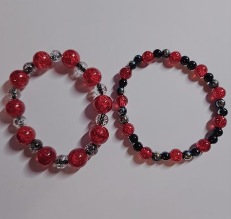 Red, black, and grey beaded bracelets. Handmade glass bead bracelets with a stretchy fit #bracelet #beadedbracelet #glassbead #glassbeadbracelet #handmade #jewlery #handmadejewlery Beaded Bracelets Handmade, Handmade Jewlery, Handmade Glass Beads, Glass Beaded Bracelets, Stretchy Bracelets, Bead Bracelets, Now And Then, Glass Bead, Bracelet Making