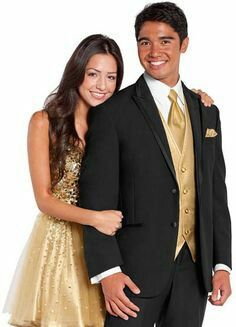 Couple wearing Black and Gold  ensemble Black Tux With Gold Accents, Gold Tux, Chambelanes Outfits, White Tuxedo Wedding, Prom Tux, Gold Tuxedo, Tuxedo Prom, Groom Tux, Quinceanera Planning