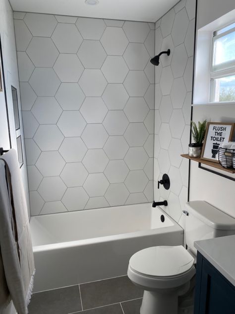 Hexagon Bathroom Shower Tile, Hex Tile Bathroom Wall, Bathroom Tub Tile Ideas Modern, Bathroom Tiles Hexagon, Small Hexagon Tile Bathroom Wall, White Hexagon Tile Shower Wall, Kids Bathroom Tiles Ideas, Hexagon Tiles Shower Wall, Large Hexagon Tile Shower Wall