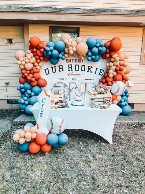 Rookie Of The Year Food Table, Son 1st Birthday Ideas, Astros 1st Birthday Party, Rookie Year Table Decor, Rookie Of The Year First Birthday Table Decor, First Rookie Year, Baseball Birthday Balloons, Rookie Of The Year First Birthday Sports, Rookie Of The Year Smash Cake Photos