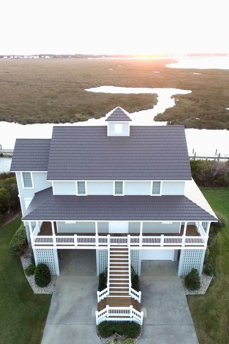 Stunning beach house in the Outer Banks of North Carolina with a beautiful metal roof designed to withstand even the harshest coastal conditions | Install by McCarthy Metal Roofing Beach House Metal Roof, Metal Roof Shingles, Aluminum Shingles, Metal Shingle Roof, Manteo Nc, Metal Roof Panels, Metal Roofing Systems, Sheet Metal Roofing, Roofing Ideas