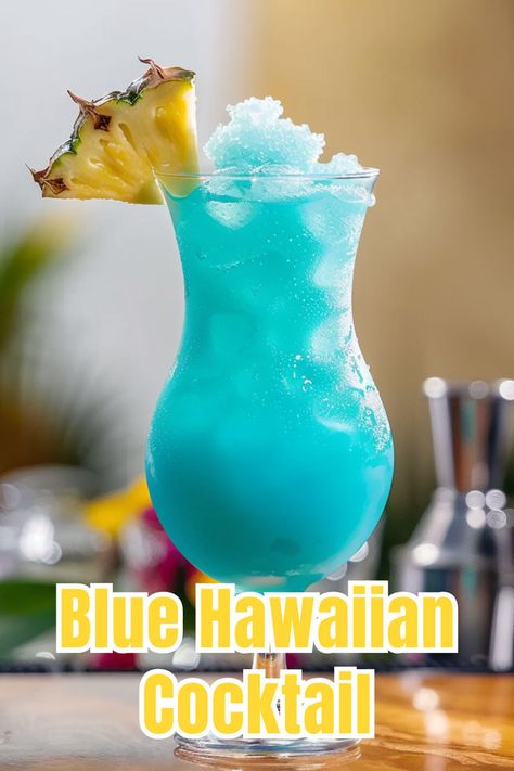 Transport yourself to a tropical paradise with the Blue Hawaiian Cocktail, a refreshing and exotic drink. Click to find out how to make this stunning beverage! Blue Hawaiian Drink, Summer Rum Cocktails, Blue Hawaiian Cocktail, Dark Rum Cocktails, Rum Cocktails Easy, Hawaiian Drinks, Cocktails To Make At Home, Hawaiian Cocktails, Alcohol Beverages