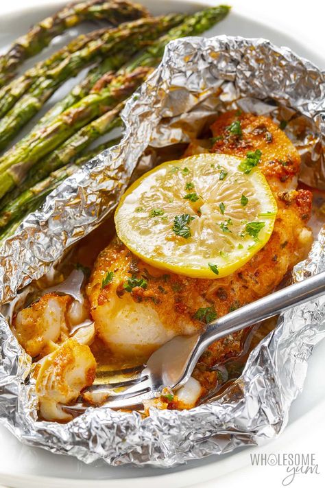 Cajun Grilled Cod In Foil (5 Ingredients!) - Wholesome Yum Grilled White Fish Recipes Foil Packets, Cod Foil Packets Ovens, Talipia Recipes Grilled In Foil, Fish In Foil Packets Ovens, Fish Foil Packets For The Oven, Grilled Cod Recipes, Grilled Cod, Haddock Recipes, Cod Fish Recipes