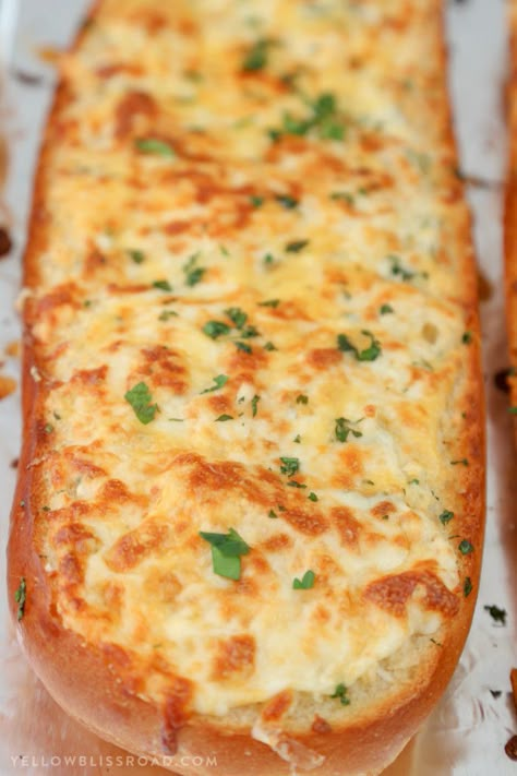 Epic Cheesy Garlic Bread with three kinds of cheese, herbs and tons of garlic. Delicious Homemade Garlic Bread! Homemade Garlic Bread Recipe, Cheesy Garlic Bread Recipe, French Bread Loaf, Homemade Garlic Bread, Garlic Cheese Bread, Garlic Bread Recipe, Cheesy Garlic Bread, Garlic Cheese, Cheesy Bread