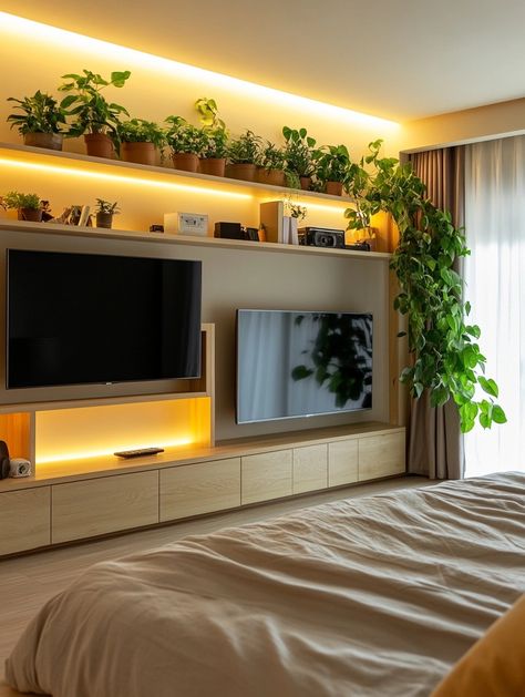 Create the perfect relaxing oasis with this cozy bedroom TV setup! Featuring a stylish TV unit with lush indoor plants, it enhances any space with warmth and greenery. Transform your room today! 🌱✨ #HomeDecor #IndoorPlants #CozyLiving Master Bedrooms Decor With Tv, Cozy Bedroom With Tv, Tv Ideas Bedroom, Bedroom Decor With Tv, Tv Setup Bedroom, Bedroom Tv Setup, Bedroom Tv Wall Ideas, Bedroom With Tv, Stylish Tv Unit