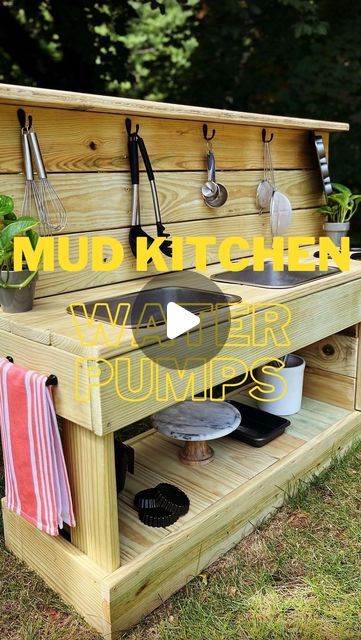 TRICIA • HOMAIN INTERIOR on Instagram: "How COOL is this?🚰😊adding WATER PUMPS to my DIY outdoor MUD KITCHEN was the best idea ever!! Find tutorials and product links to this adorable outdoor kids DIY in my mud kitchen highlights and follow along to see what I do next!   #mudkitchen #waterpump #kidsplay #diykids #montessoriathome" Kids Outdoor Mud Table, Outside Mud Kitchen For Kids, Mud Kitchen Water Dispenser, Easy Mud Kitchen Diy, Mudkitchen Outdoor Diy, Pallet Mud Kitchen Diy, Diy Mud Kitchen Outdoor Play, Mud Kitchen For Kids Diy, Diy Kids Mud Kitchen