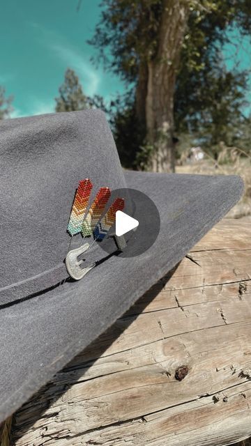 Custom Western Beadwork | Beaded Flatbrims on Instagram: "Every Hat deserves a Beaded Hat Feather

No hat is complete without a feather

Hand made to insure high quality work that will last a lifetime. Beaded from high quality glass beads and quality metal centers.

There is no reason to not have one for your hat

Check ‘em out in our best sellers section on the website 🤎" Beaded Hat Brim, Hat Pins Diy, Product Wishlist, Pins Diy, Beaded Hat, Feather Hat, Quality Work, Hat Pins, Diy Beads