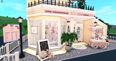 Bloxburg Cafe Apartment, Kawaii Cafe Exterior, Cafe Design Bloxburg, Bloxburg Diner Exterior, Vixie Bloxburg, Bloxburg Candy Shop, Pandalemontart Bloxburg, Bloxburg Flower Shop Ideas, Hello Kitty Cafe Bloxburg