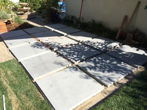 These 36” square slab pavers are perfect for a DIY patio that’s modern yet timeless. I used a 2x4 to creat even gaps between them. Slab Patio Ideas, Large Backyard Landscaping Ideas, Square Pavers, Backyard Pavers, Rock Patio, Diy Concrete Patio, Pavers Design, Kid Friendly Backyard, Affordable Backyard Ideas