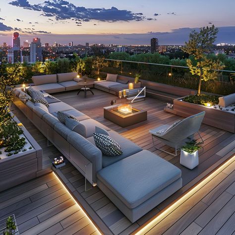 Explore our stunning rooftop deck with sleek modern furniture and wooden flooring, perfect for evening relaxation. This space features a cozy fire pit, lush green plants, and ambient LED lighting, all set against a breathtaking city skyline at dusk. Ideal for urban outdoor living.