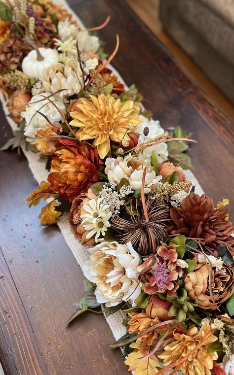 ** Made to Order ** 3 ft or 4 ft garland This warm, fall garland is dense with autumn flowers and foliage in colors of creams, golds, rusts and browns!  This is a statement fall centerpiece for your home or other decor needs!  Peonies, dahlias, mums, hydrangeas, fall heather and grasses, wildflowers, berries and cream pumpkins and gourds are only some of the many beautiful elements that make up this garland!  Use all Autumn long or for a special Thanksgiving dinner, on a mantel, as a table runner, hung on a wall or railing, to bring the warm colors of fall harvest décor to your home.   ** As this is a MADE TO ORDER item, some exact elements shown in the pictures may not be available and will be substituted with similar items, the look and colors will be the same. Please allow at least 1-2 Fall Wedding Arch, Rustic Floral Decor, Rustic Garland, Faux Garland, Fall Wedding Arches, Thanksgiving Garland, Wedding Swag, Wedding Runner, Floral Runner