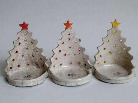 Reverse side of Christmas Tree tea light holders in Raku | Ceramic christmas decorations, Holiday pottery, Clay christmas decorations Kiln Guardian Ideas, Hand Built Pottery Christmas Ornaments, Ceramic Tea Lights, Tea Light Holder Ceramic, Air Dry Clay Tea Light Holder, Xmas Pottery Ideas, Holiday Ceramics Ideas, Ceramic Xmas Decorations, Pottery Tea Light Holders